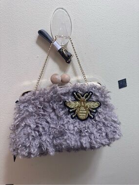 Gama Pouch" shaggy faux fur clutch/crossbody handbag by Unbillion